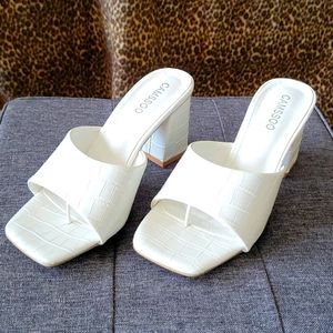 Never worn, brand new sandals, 3"heels,  E